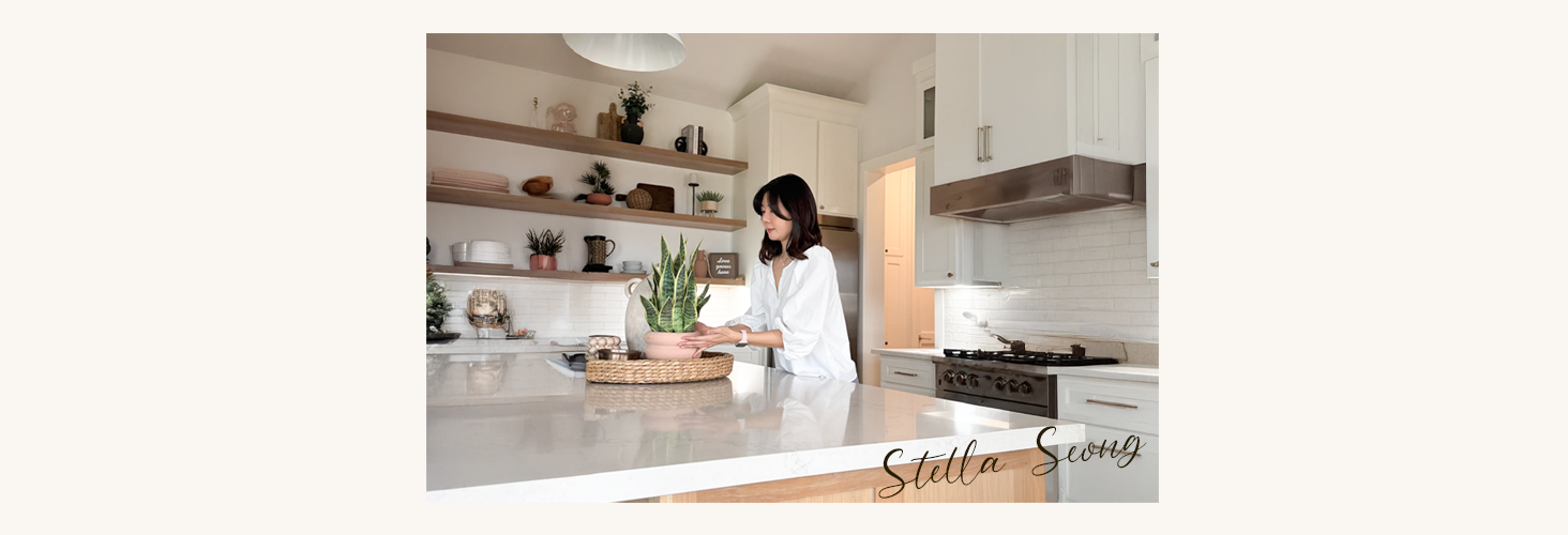Stella Seong the owner of brand putting pot on white countertop in Kitchen
