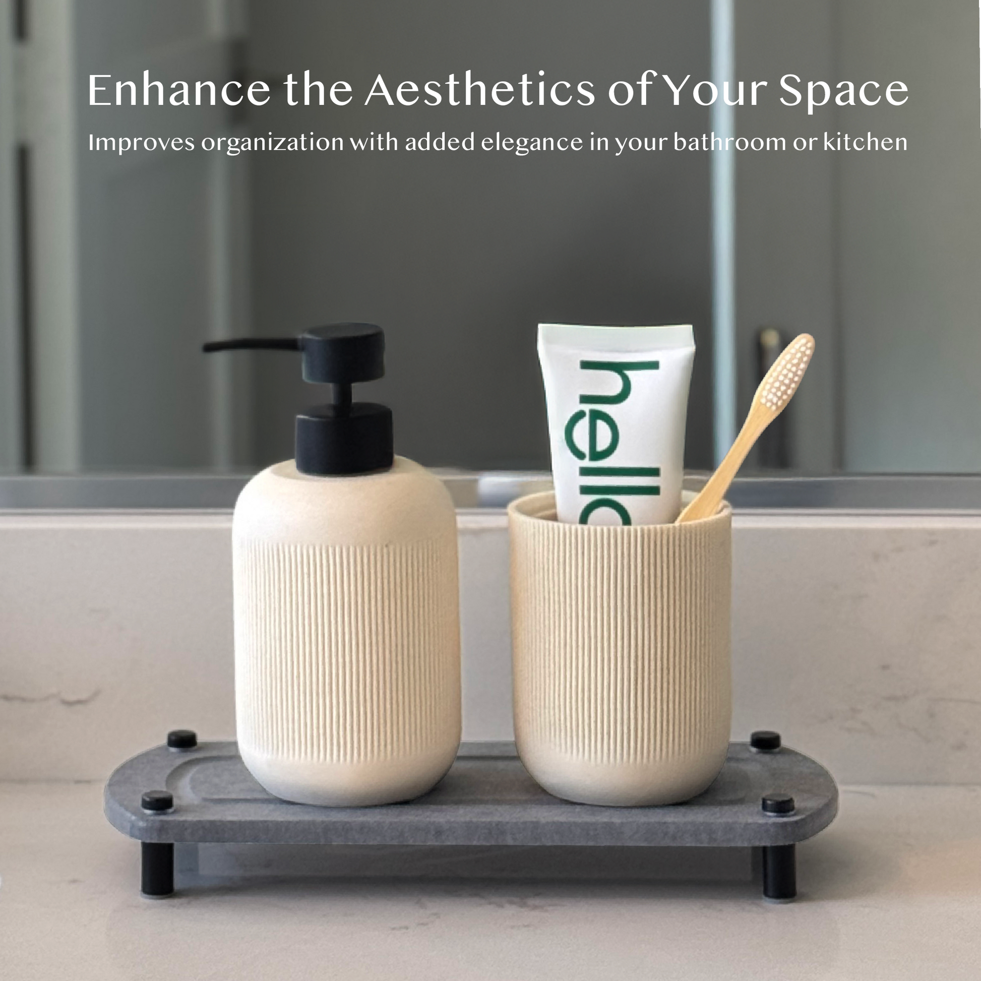 Hand soap and white canister with toothpaste and tooth brush neatly placed on a glacier gray sink caddy, set against a bathroom backdrop.