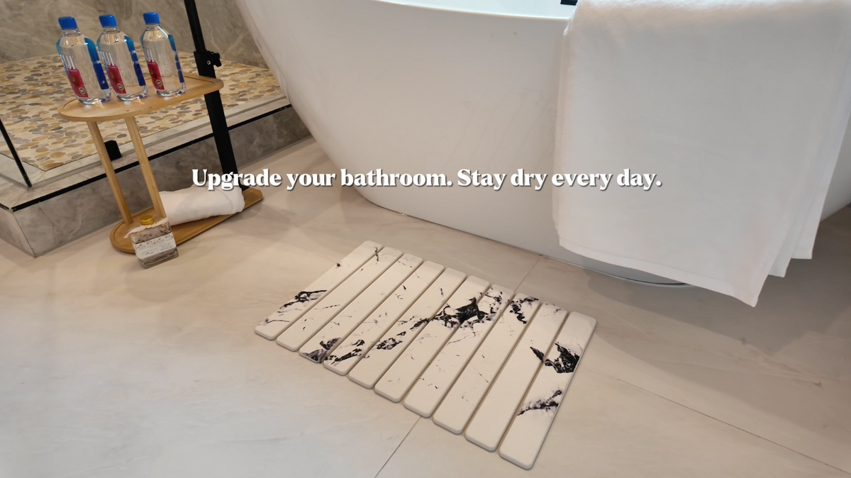 Load video: A video showcasing the drying performance of the Instant Dry Sink Caddy, highlighting its ability to absorb water instantly. The video also demonstrates its versatile uses, including as a plant tray, bathroom organizer, and kitchen sink caddy, seamlessly blending functionality with style.